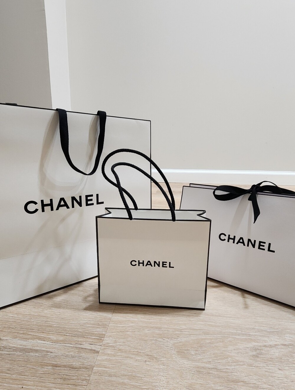 AUTHENTIC 3 piece CHANEL gift bag, triangular folding clutch, mini gift bag